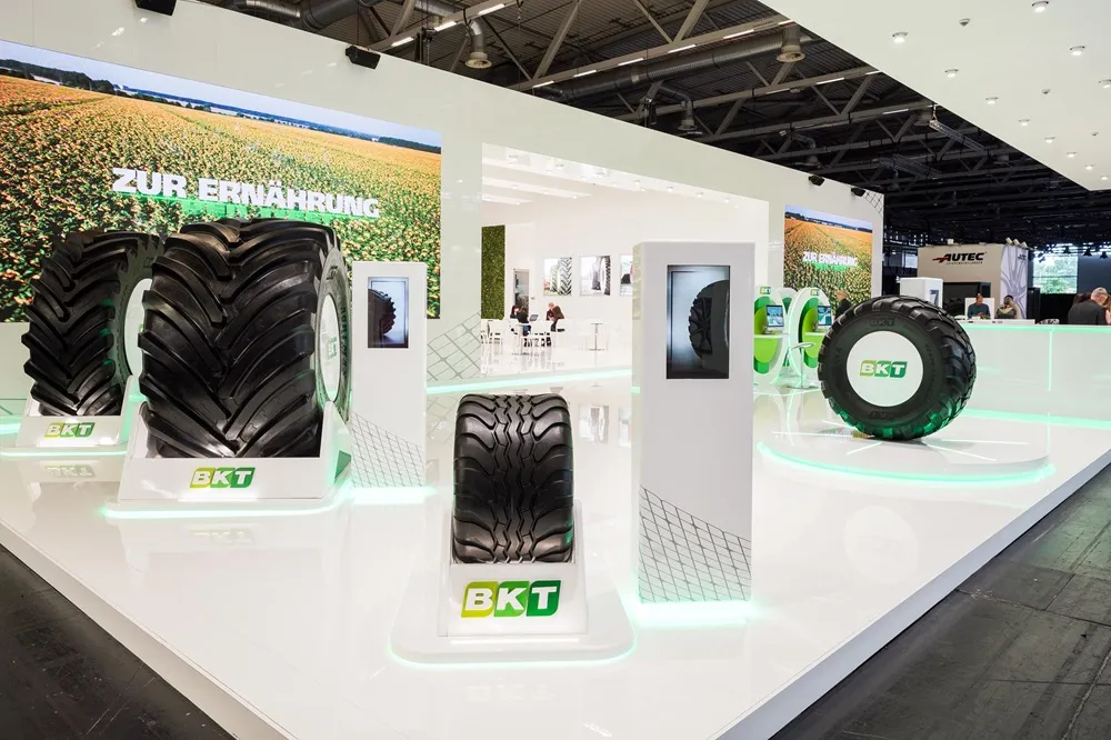 NKT display with tractor and construction tyres at The Tire Cologne 2024