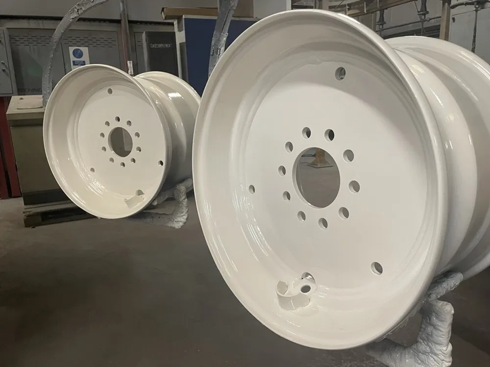 Two Trelleborg wheels in white in the Trelleborg factory