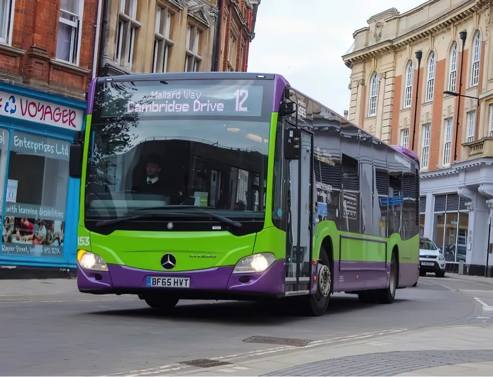 Photo of a green and purple Ipswich bus with Michelin tyres