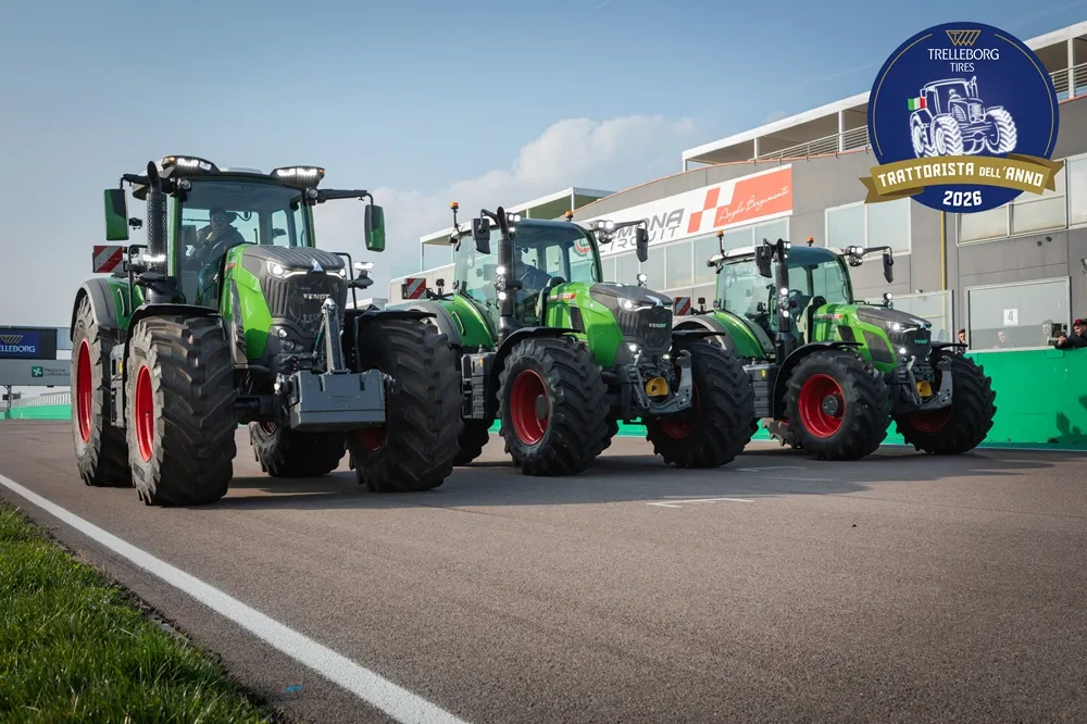 Three green tractors in a row at the Tractor of the Year Competition in Italy.