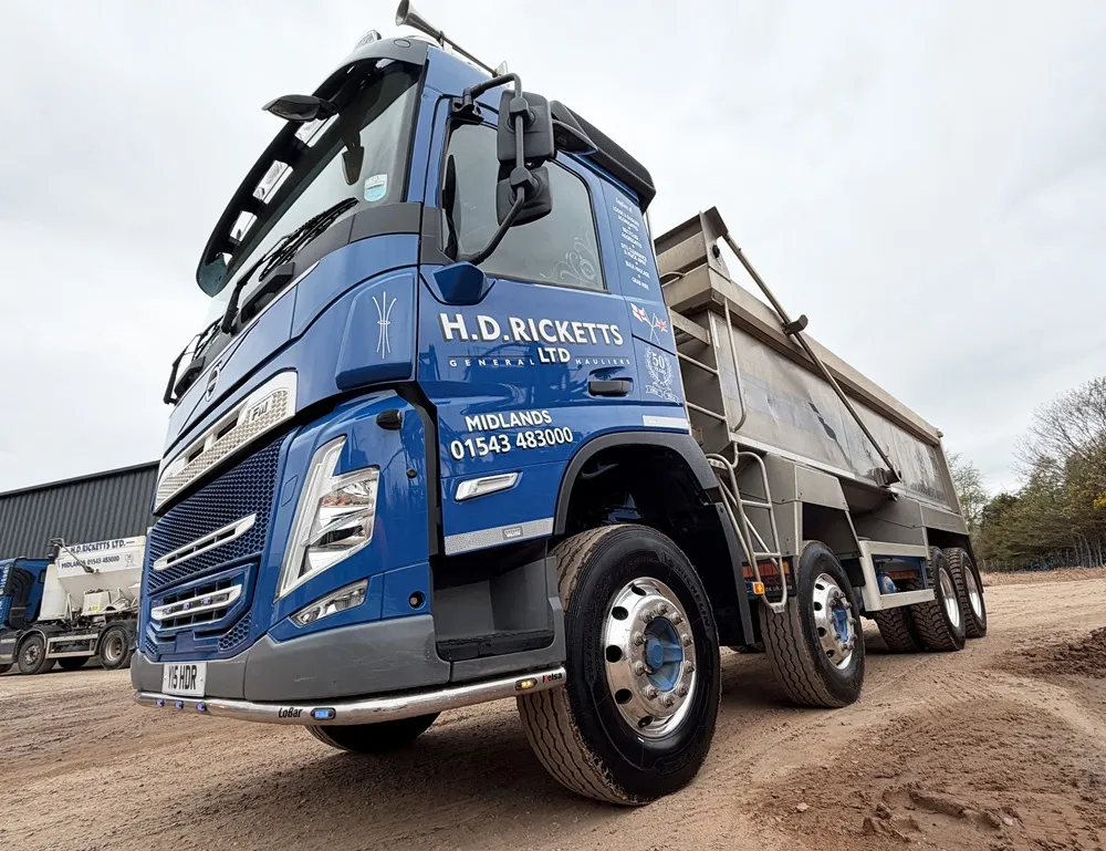 Image of a blue HD Ricketts truck from a low front angle